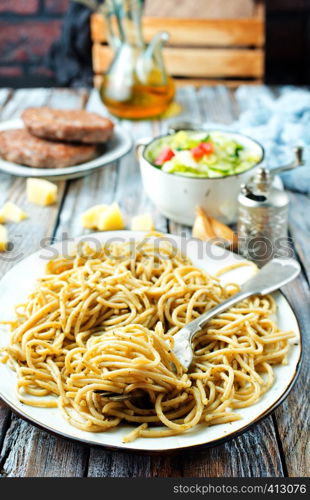 spaghetty with pesto sauce, boiled spaghetty on plate