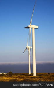 spain house africa wind turbines and the sky in isle of lanzarote