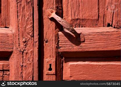 spain knocker lanzarote abstract door wood in the red brown &#xA;