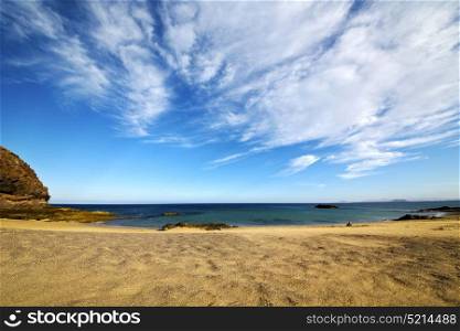 spain sky cloud beach water coastline and summer in lanzarote