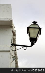 spain street lamp a bulb in the cloudy sky wall arrecife teguise lanzarote &#xA;