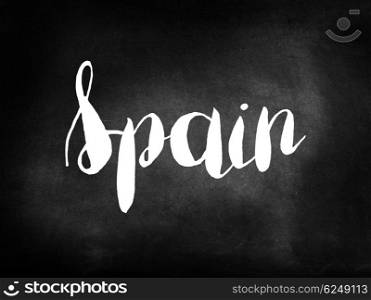 Spain written on a blackboard