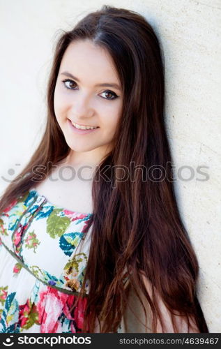 Spanish brunette girl with long hair on the street