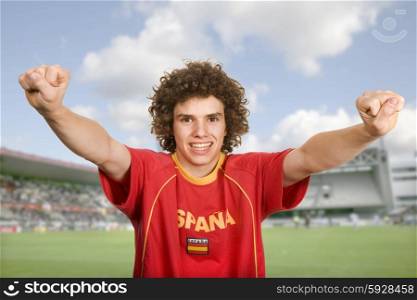 spanish young boy supporter in a soccer arena
