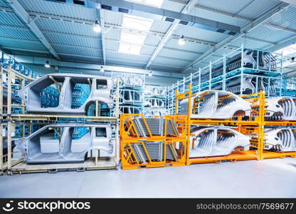 spare parts in a car factory. spare parts in a car plant