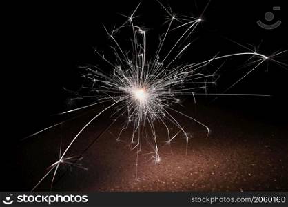 Sparkler. Abstract background for Christmas and Happy New Year 2022