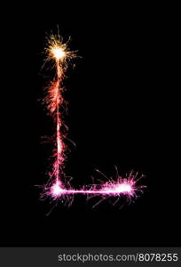 Sparkler firework light alphabet L (Capital Letters) at night background