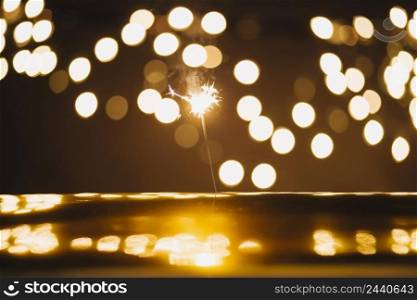 sparkler lights reflective surface