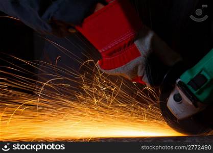 Sparks while grinding iron