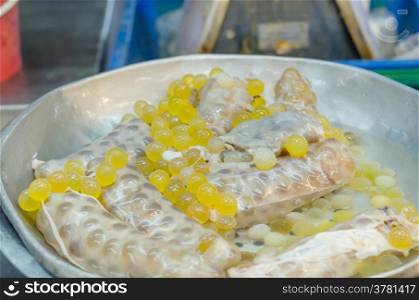 Spawn fish. yellow Spawn of giant catfish at market