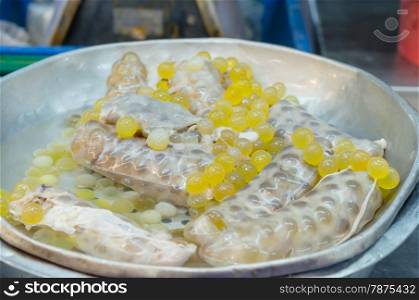 Spawn fish. yellow Spawn of giant catfish at market