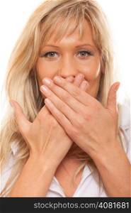 Speak no evil concept. Surprised woman face, covering her mouth with hands isolated