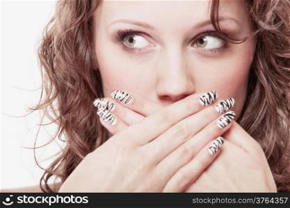 Speak no evil concept. Surprised woman face, girl covering her mouth with hands over white background