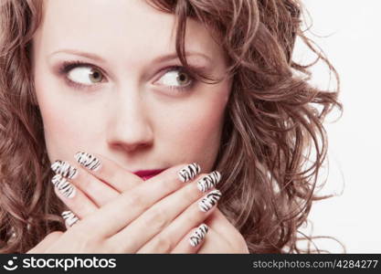 Speak no evil concept. Surprised woman face, girl covering her mouth with hands over white background