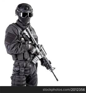 Spec ops police officer SWAT in black uniform and face mask. Spec ops police officer SWAT