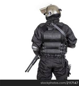 Spec ops soldier in black uniform and face mask shot from behind