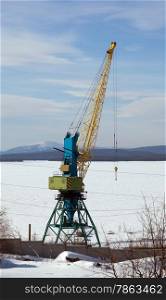 special crane boom. North Port in the winter. A bright sunny day