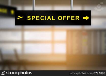 special offer on airport sign board with blurred background and copy space