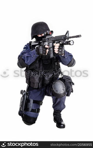 Special weapons and tactics (SWAT) team officer with his gun