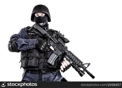 Special weapons and tactics SWAT team officer with his gun