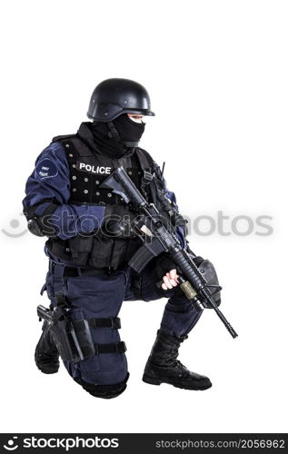 Special weapons and tactics (SWAT) team officer with his gun