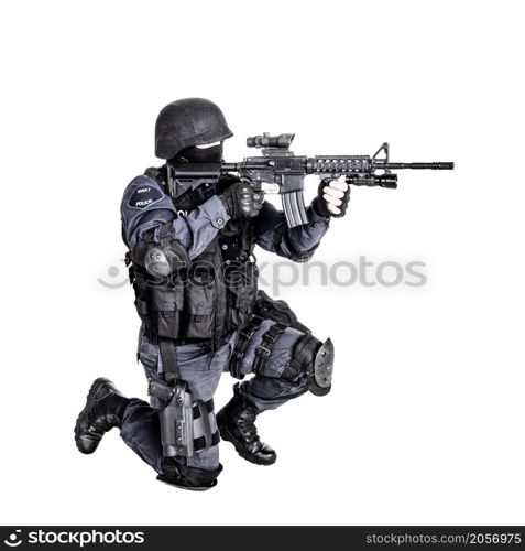 Special weapons and tactics SWAT team officer with his gun