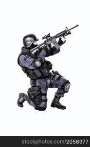 Special weapons and tactics SWAT team officer with his gun