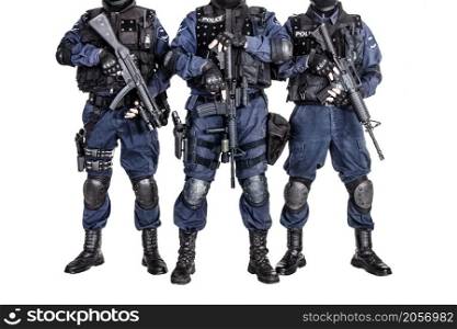 Special weapons and tactics SWAT team officers with guns
