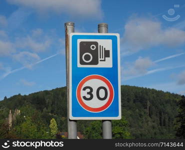 Speed camera sign, with 30 kmph or 30 mph. speed carmera sign