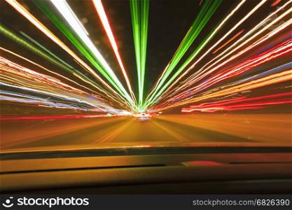 Speed car lights trails.. Long exposure speed car lights trails on a night highway.