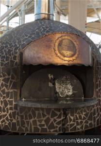 spherical Wood-burning Oven with Copper Sign