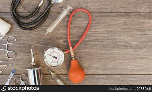 sphygmomanometer stethoscope medical equipment s wooden desk