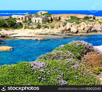 Spiaggia Massolivieri beach summer sea landscape (Siracusa, Sicily, Italy). People unrecognizable.