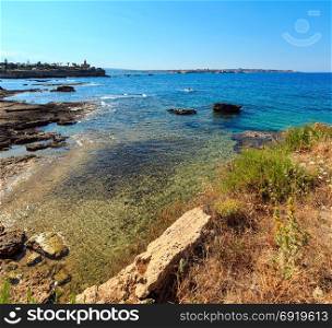 Spiaggia Massolivieri coast summer sea landscape (Siracusa, Sicily, Italy). Two shots composite image.