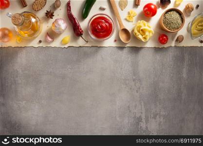spice and herbs ingredients at stone background