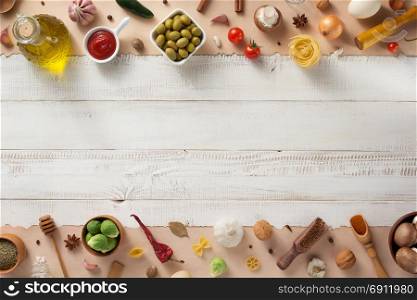 spice and herbs ingredients at wooden background