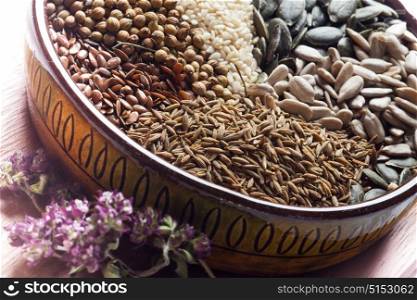Spices and herbs in ceramic bowl. seasoning. Colorful natural additives.