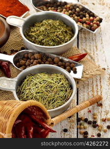 Spices And Herbs On A Wooden Table