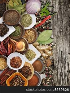 Spices And Herbs On Rusty Old Wood