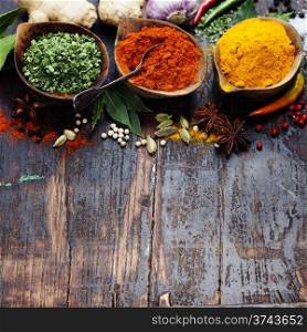 Spices and herbs over Wood. Food and cuisine ingredients.