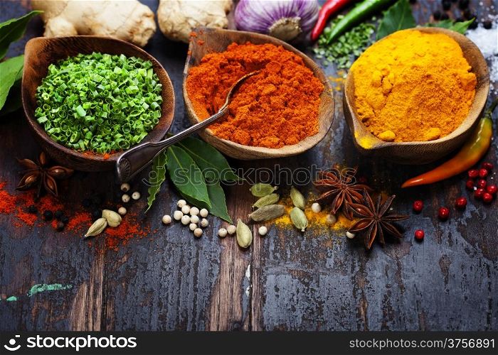 Spices and herbs over Wood. Food and cuisine ingredients.