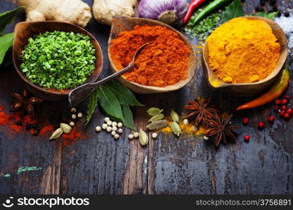 Spices and herbs over Wood. Food and cuisine ingredients.