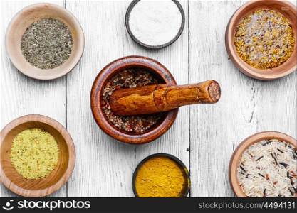 Spices and seasoning in wooden bowls
