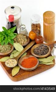 spices arrangement on a wooden cutting board