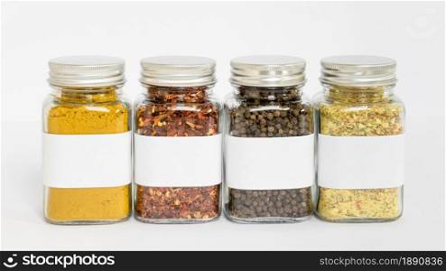 spices jars with labels arrangement. Resolution and high quality beautiful photo. spices jars with labels arrangement. High quality and resolution beautiful photo concept