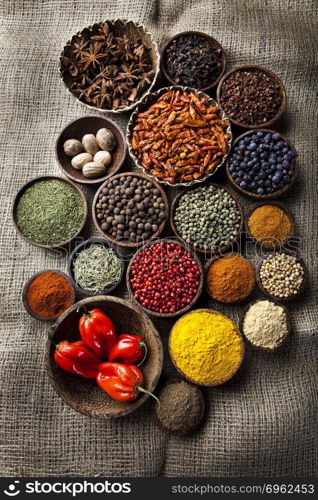 Spices on a wooden table, orintal cuisine vivid theme