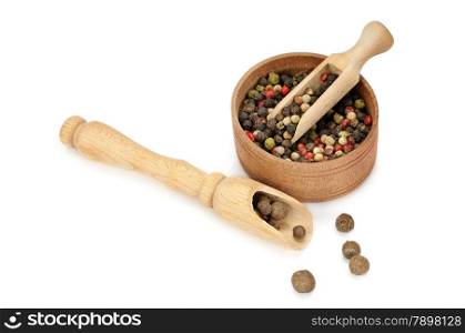 spices, scoop and bowl isolated on white background