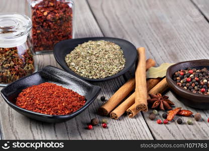 spices set on a wooden background. spices set