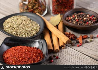 spices set on a wooden background. spices set