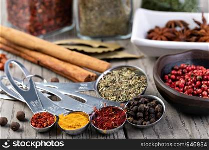 spices set on a wooden background. spices set